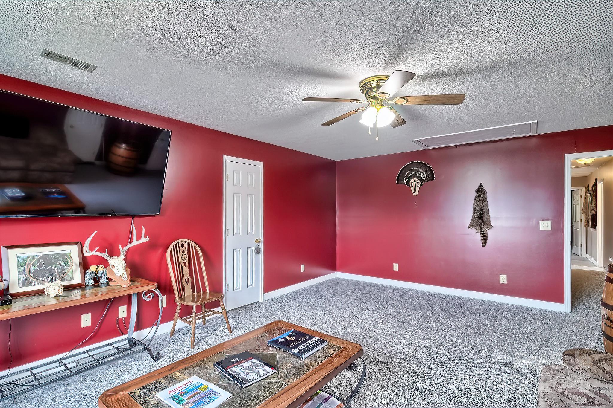 176 Griffin Road Pageland, SC 29728 - Photo 44 of 46 a very nice looking room with a flat screen tv