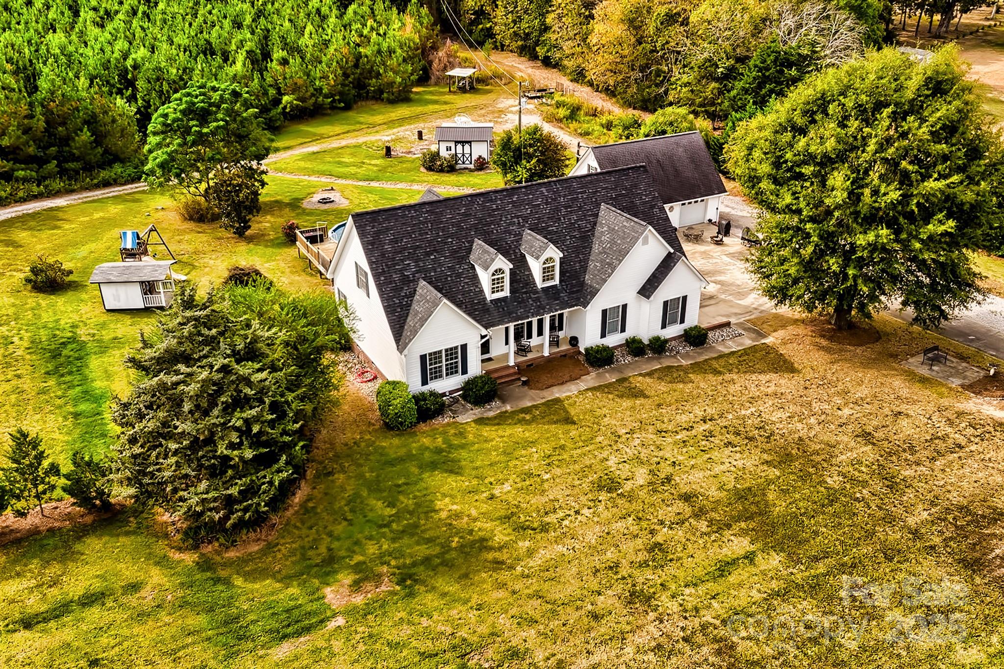 176 Griffin Road Pageland, SC 29728 - Photo 9 of 46 a view of a house with a yard