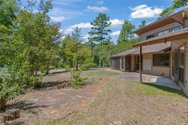 a house with a tree in the background
