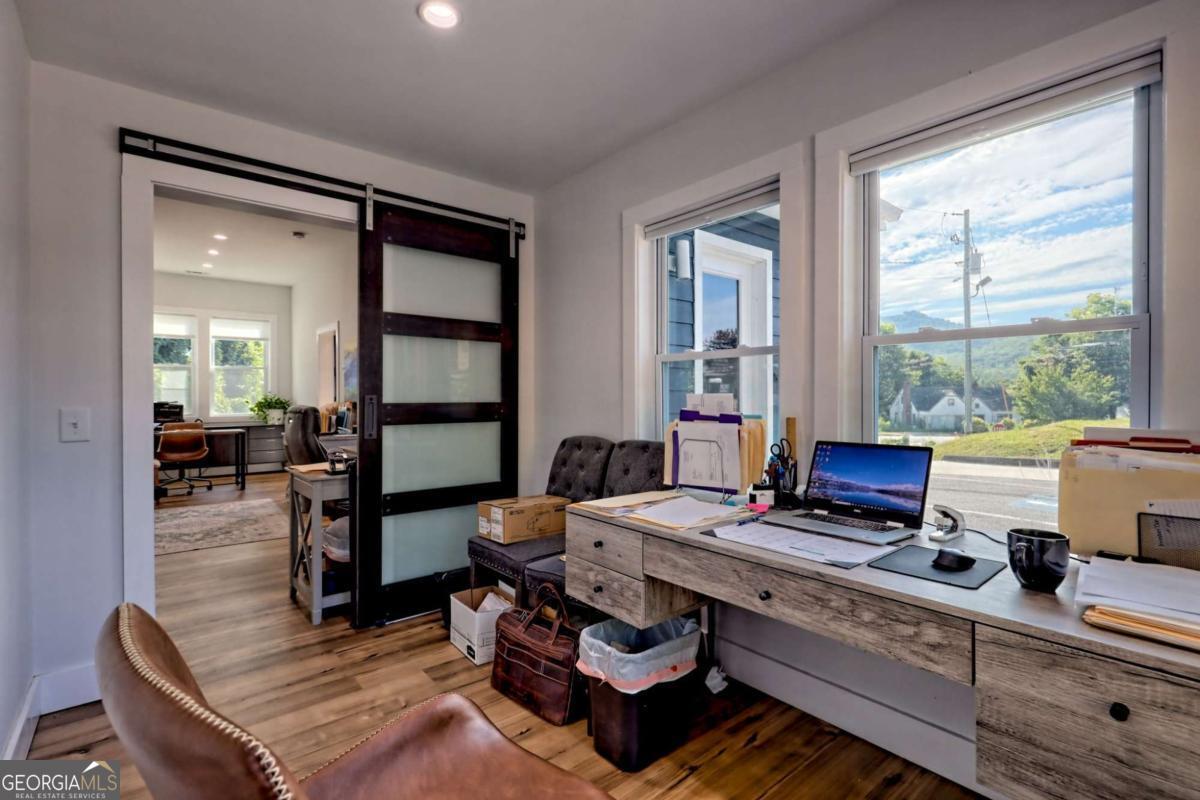 25 Valley Street Clayton, GA 30525 - Photo 18 of 81 a living room with furniture and a window