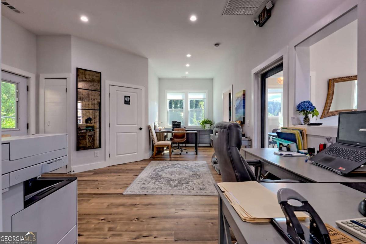 25 Valley Street Clayton, GA 30525 - Photo 19 of 81 a living room with furniture and wooden floor