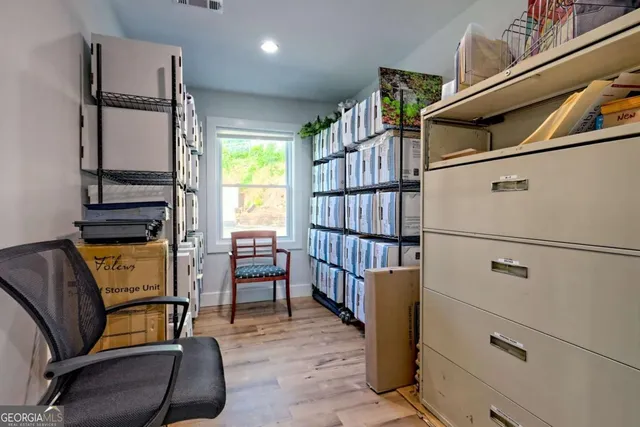 a view of a swimming pool with a patio