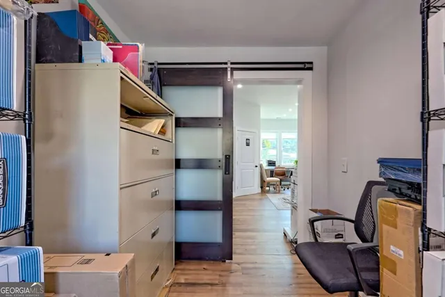 a kitchen with a stove and a microwave
