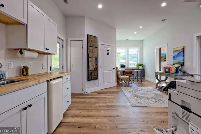 a room with furniture and a large window