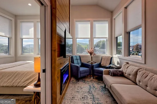 an aerial view of residential houses with outdoor space