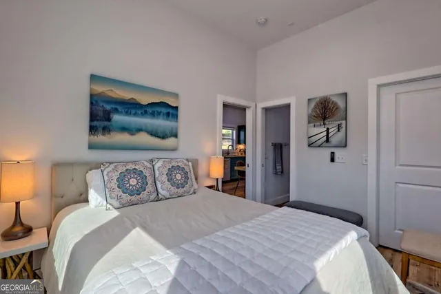 a view of a backyard with plants and a patio