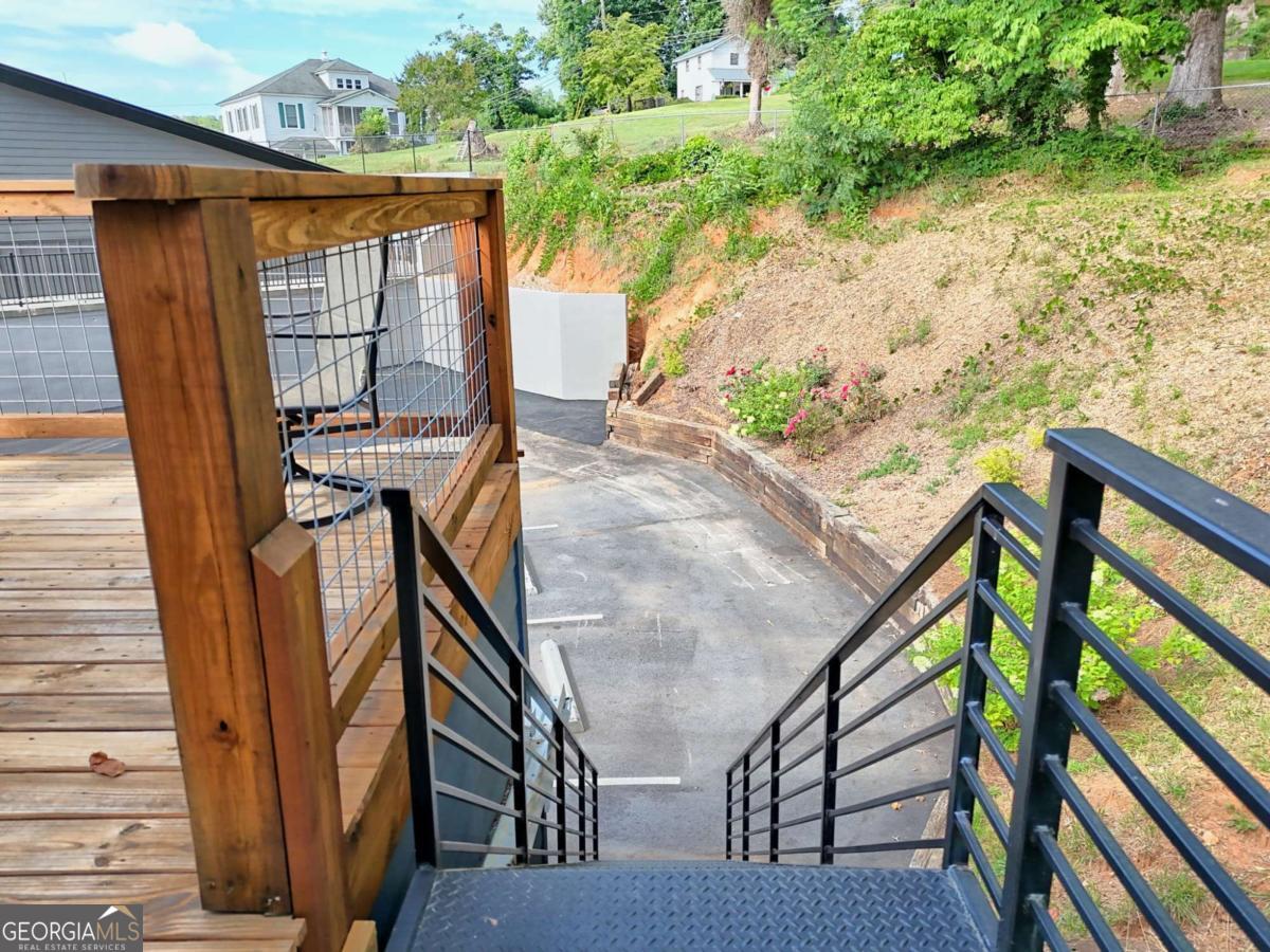 25 Valley Street Clayton, GA 30525 - Photo 57 of 81 a balcony view with two chairs and a table