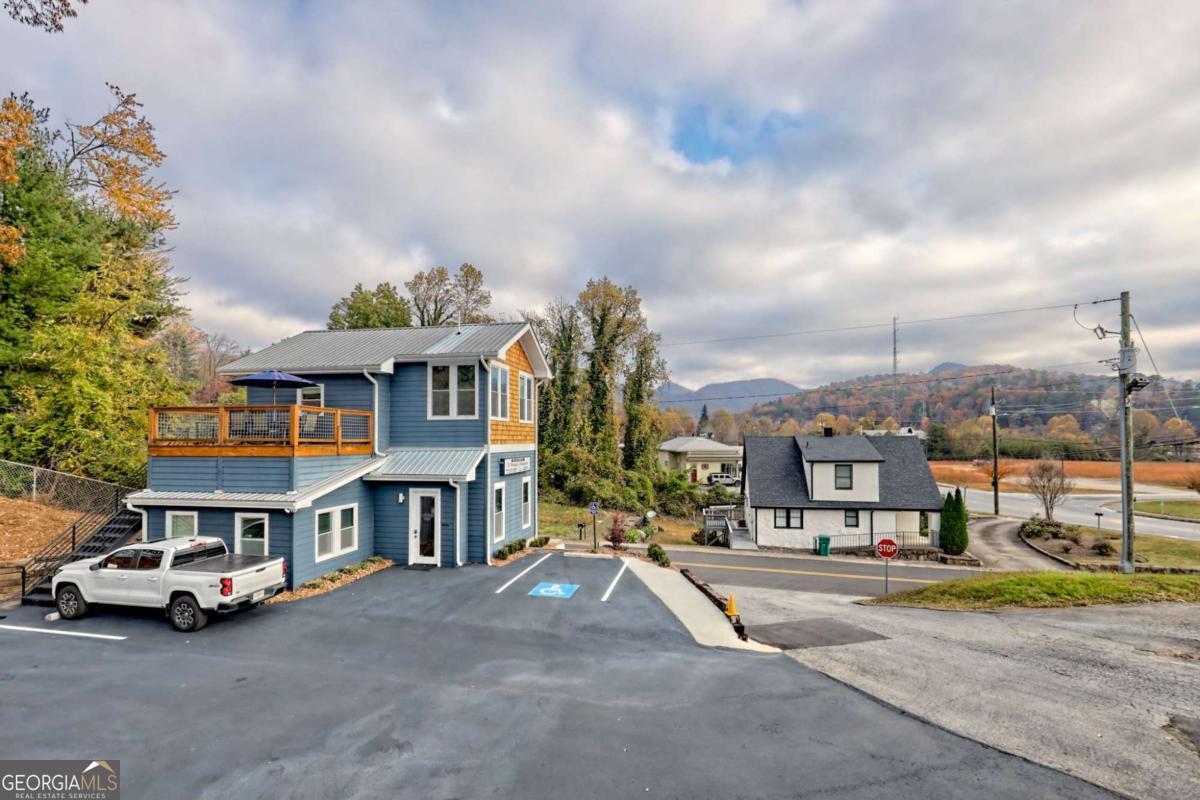 25 Valley Street Clayton, GA 30525 - Photo 70 of 81 a car parked in front of a building