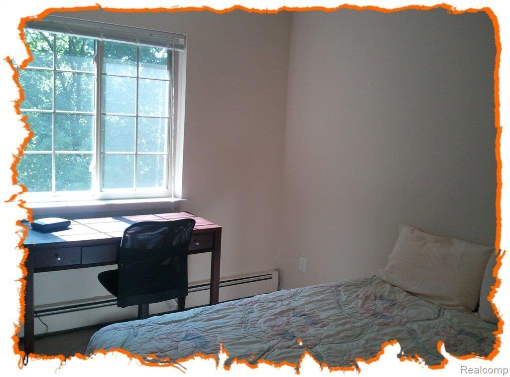 418 Baldwin Avenue, Unit 303 Rochester, MI 48307 - Photo 13 of 15 bed2.jpg