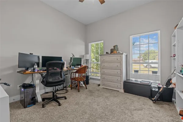 a view of a livingroom with shelves