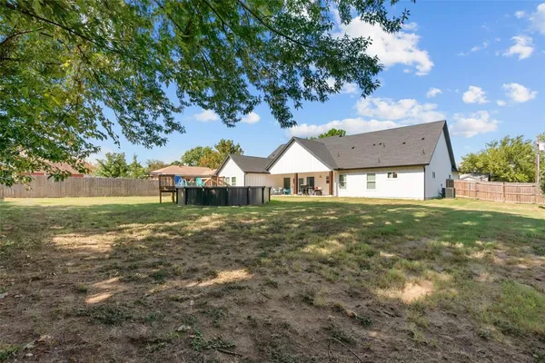 a view of house with garden
