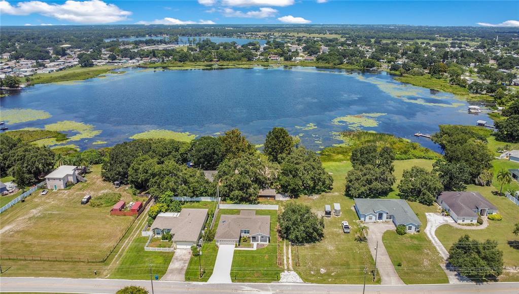 35 South Lake Fox Road Winter Haven, FL 33884 - Photo 38 of 43 an aerial view of residential houses with outdoor space