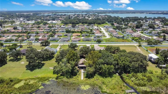 a view of a city with a lake