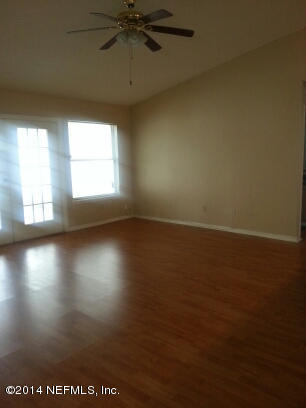 3493 White Wing Road Orange Park, FL 32073 - Photo 11 of 27 an empty room with a window