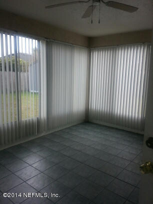 3493 White Wing Road Orange Park, FL 32073 - Photo 19 of 27 a view of an empty room with a window
