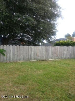 3493 White Wing Road Orange Park, FL 32073 - Photo 23 of 27 a view of outdoor space with wooden fence