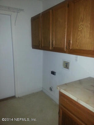 3493 White Wing Road Orange Park, FL 32073 - Photo 25 of 27 a utility room with dryer and washer