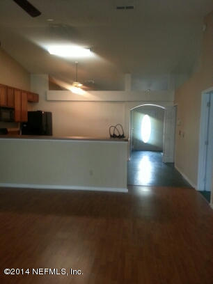 3493 White Wing Road Orange Park, FL 32073 - Photo 9 of 27 a view of empty room with wooden floor