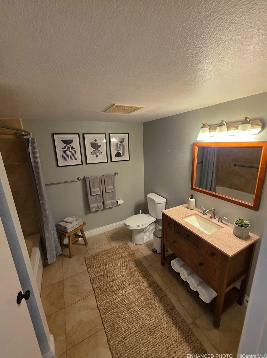 91-1024 Kaiau Avenue, Unit 4A Kapolei, HI 96707 - Photo 6 of 10 Enhanced PhotoLarge size bathroom.
