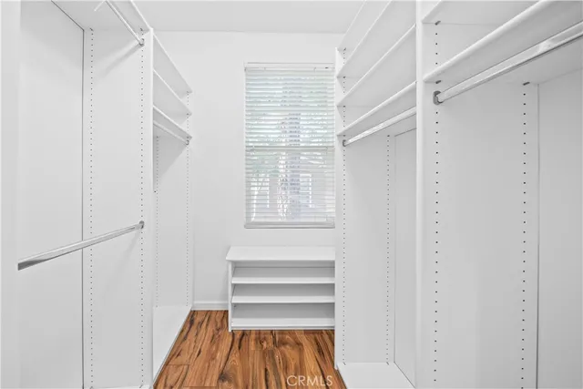 a view of closet area with empty racks