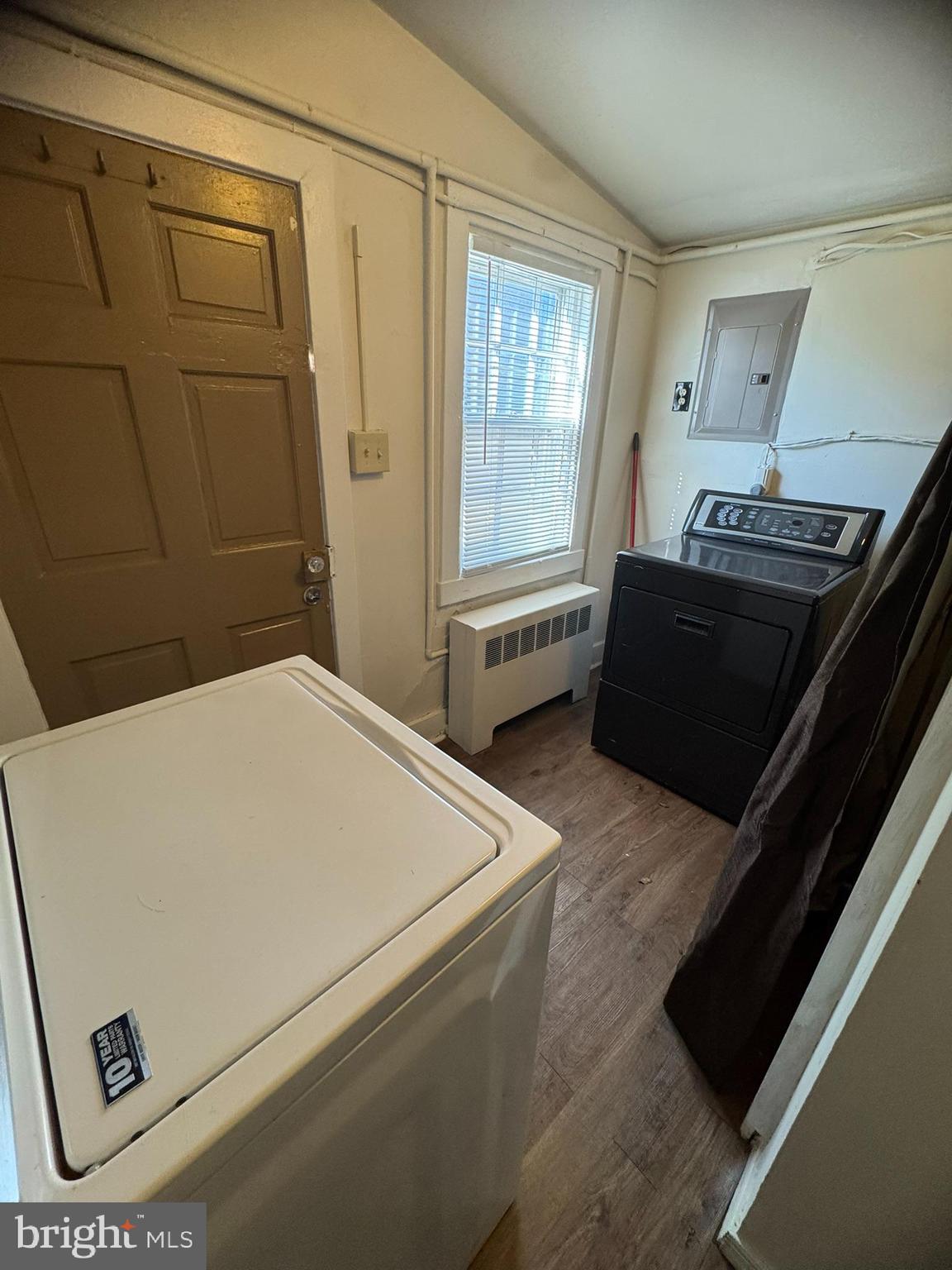 125 South Bentz Street Frederick, MD 21701 - Photo 6 of 16 a bedroom with a bed and a window