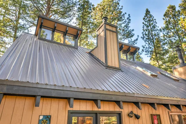 a picture of a bathroom with a shower