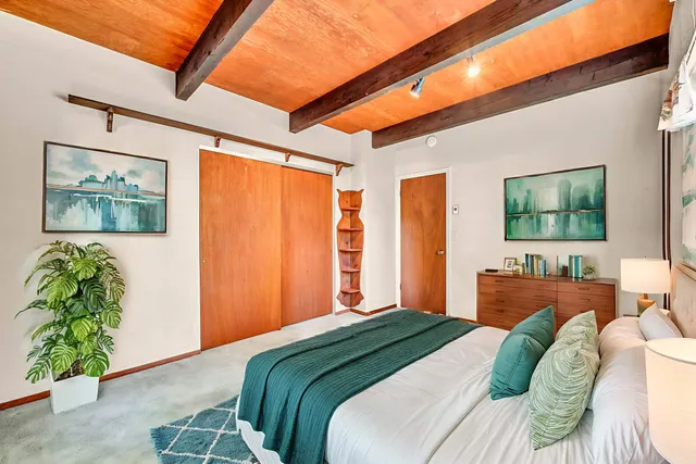 a view of front door and bedroom