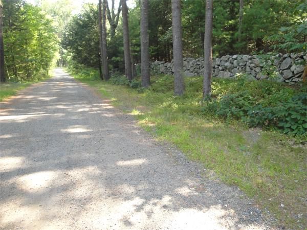 35 Ipswich Road Boxford, MA 01921 - Photo 18 of 18 a view of a yard with trees in the background