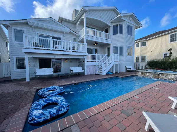 a living room with furniture and window