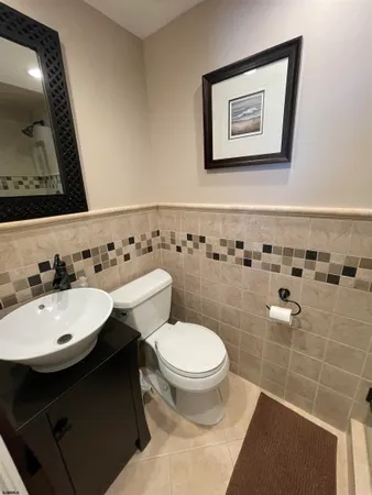 a view of a patio with a table and chairs