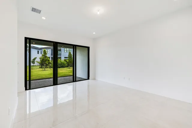 an empty room with window