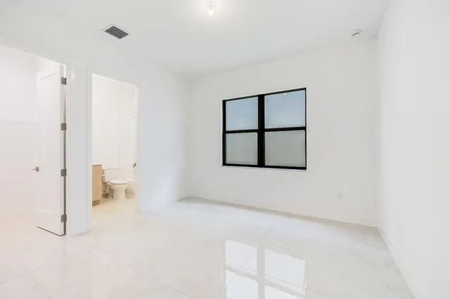 a view of a room with racks on the wall