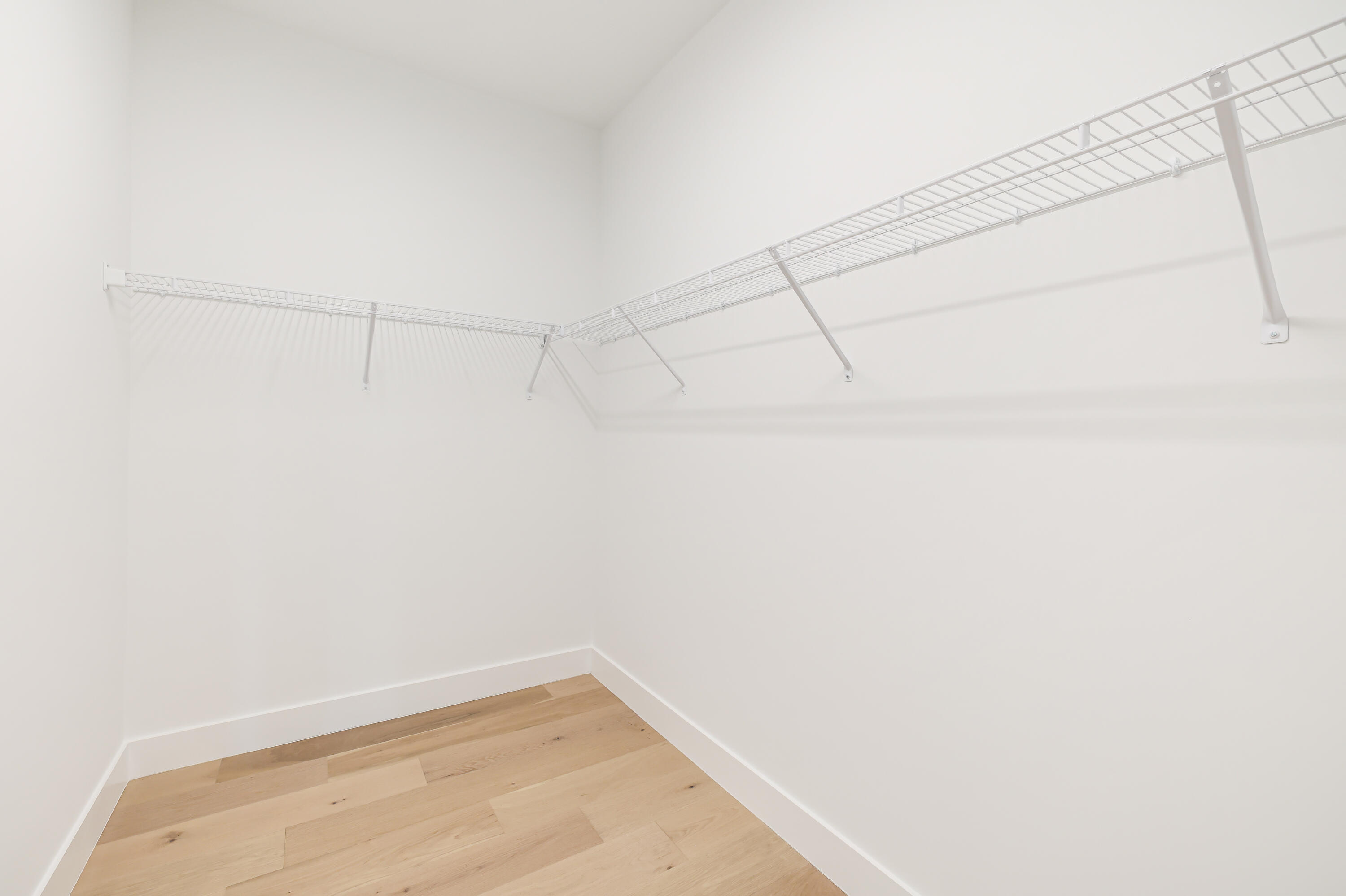 9451 Riverside Pk Drive Boca Raton, FL 33434 - Photo 30 of 71 a view of a room with racks on the wall