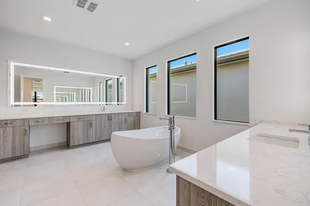a bathroom with a sink a toilet and a bathtub