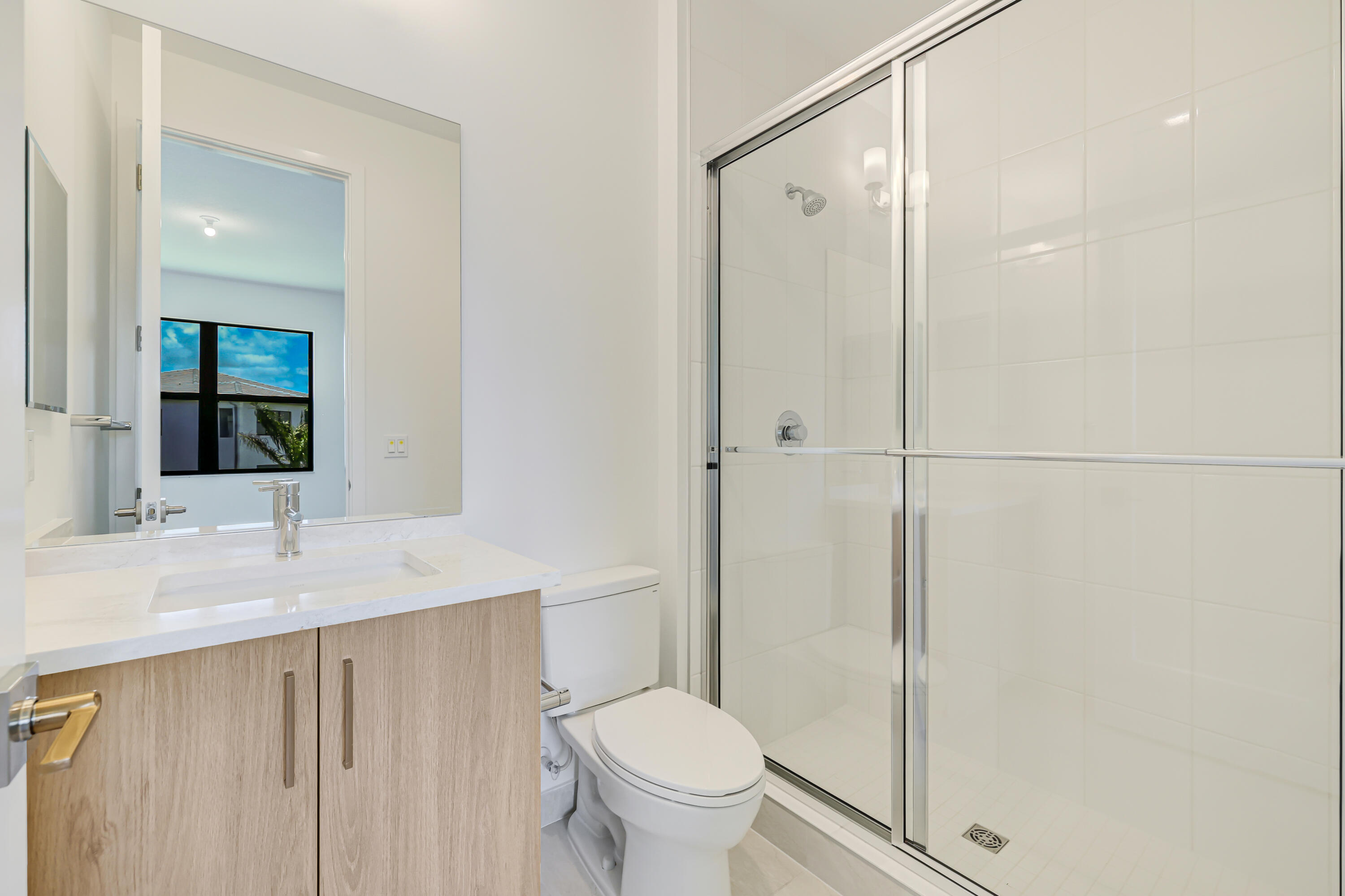 9451 Riverside Pk Drive Boca Raton, FL 33434 - Photo 37 of 71 a bathroom with a granite countertop sink toilet and shower