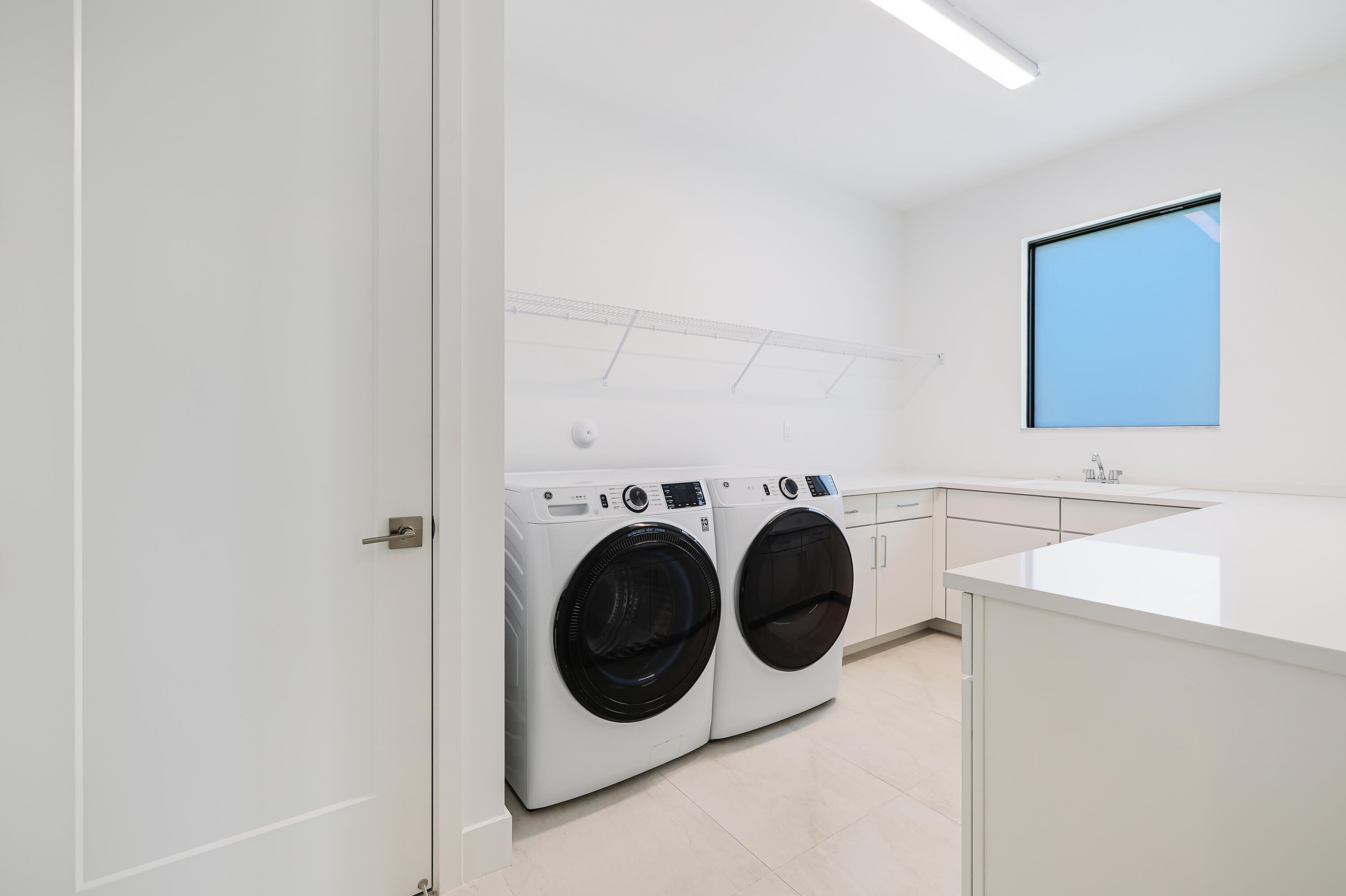 9451 Riverside Pk Drive Boca Raton, FL 33434 - Photo 41 of 71 a utility room with dryer and washer