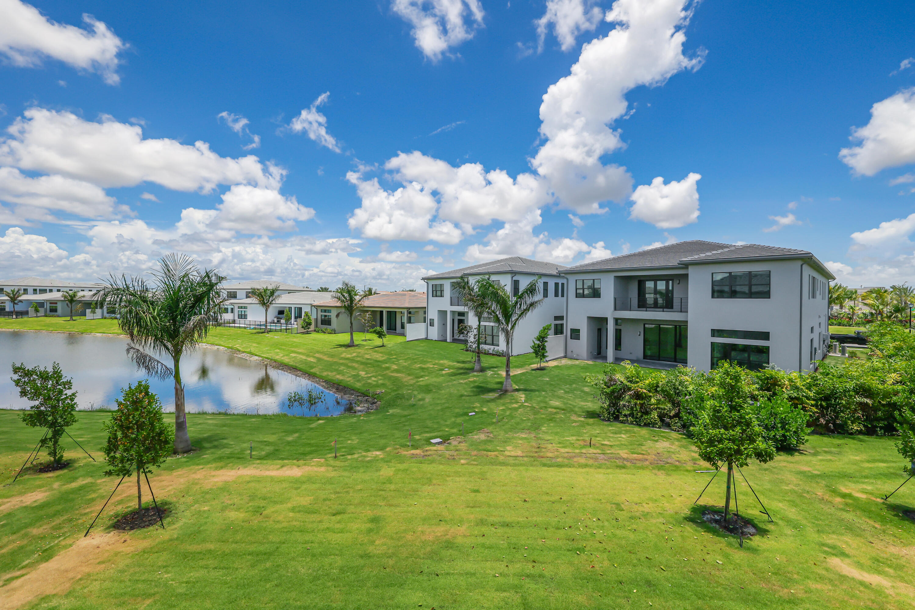9451 Riverside Pk Drive Boca Raton, FL 33434 - Photo 51 of 71 a front view of house with yard and green space