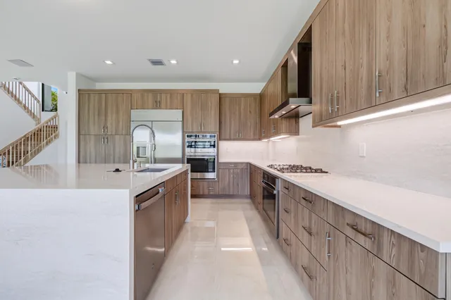 a view of an empty room with a sliding door