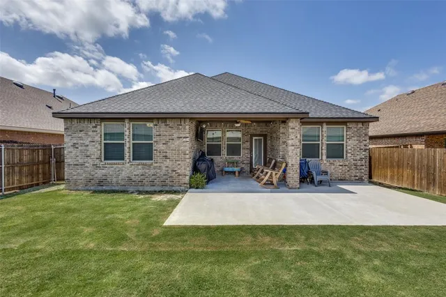 a view of a house with patio