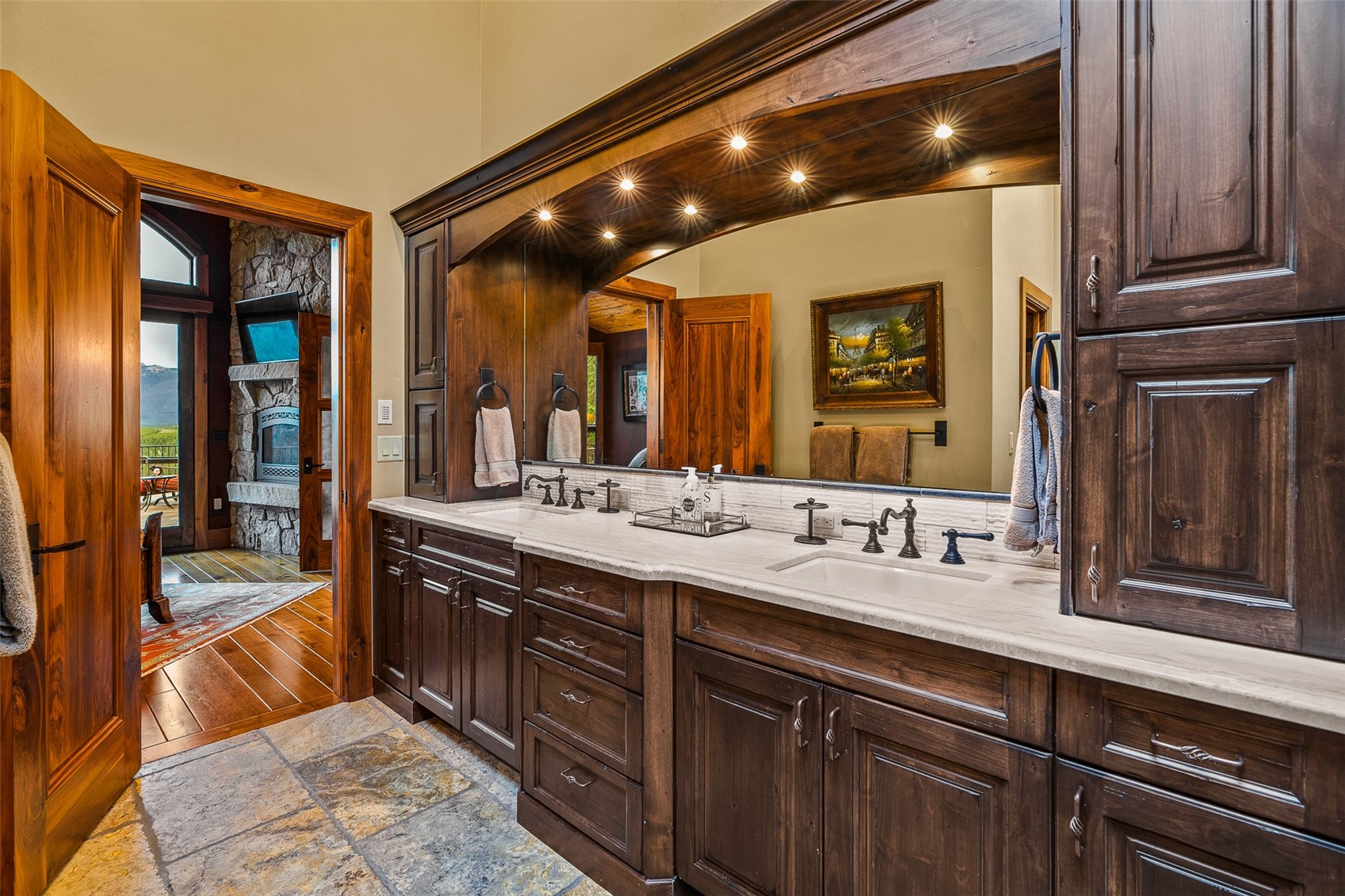 31 Pinnacle Lane Dillon, CO 80435 - Photo 20 of 50 a spacious bathroom with a sink and mirror
