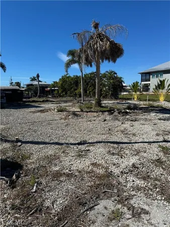 a view of a yard with an outdoor space