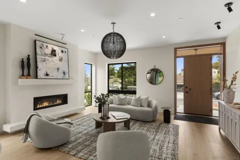 a kitchen with stainless steel appliances kitchen island granite top and refrigerator