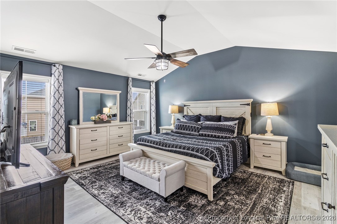 121 Colonist Place Cameron, NC 28326 - Photo 25 of 46 a living room with furniture and a chandelier