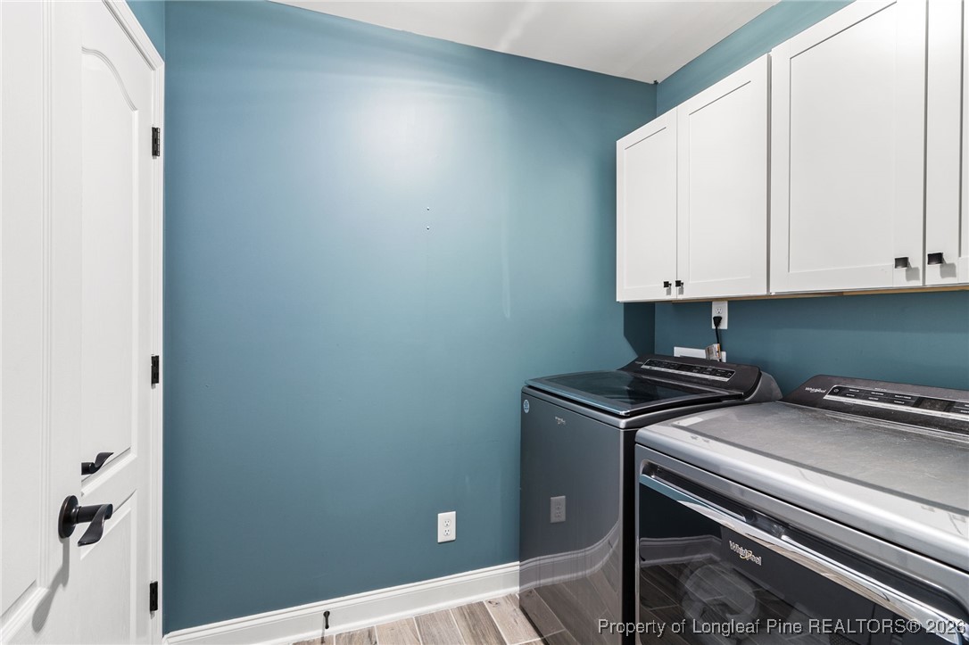 121 Colonist Place Cameron, NC 28326 - Photo 39 of 46 a view of cabinets and wooden floor