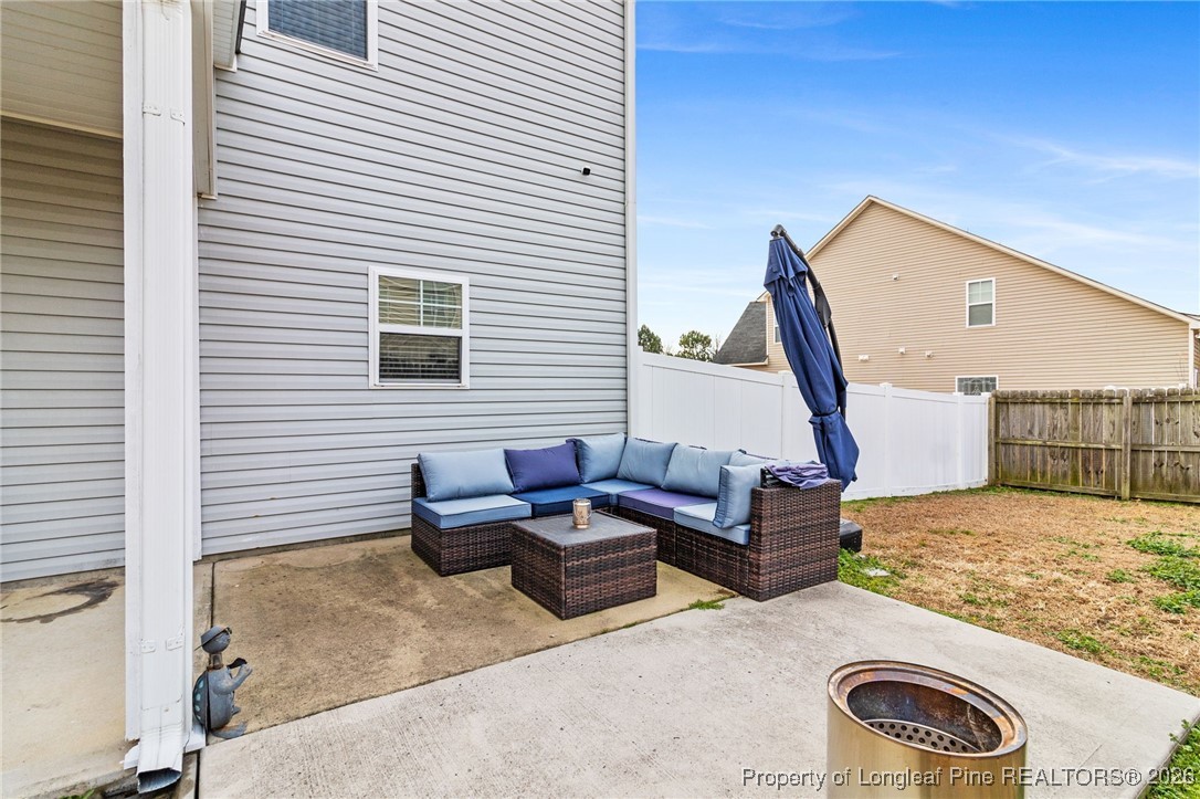 121 Colonist Place Cameron, NC 28326 - Photo 41 of 46 a backyard of a house with barbeque oven