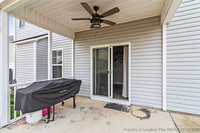 a view of a house with a snow in the yard