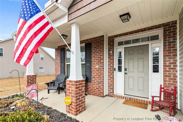 a view of front door and bedroom
