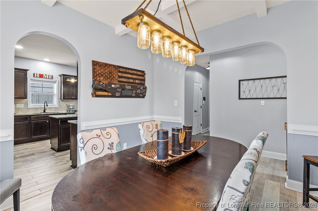121 Colonist Place Cameron, NC 28326 - Photo 10 of 46 a living room with kitchen