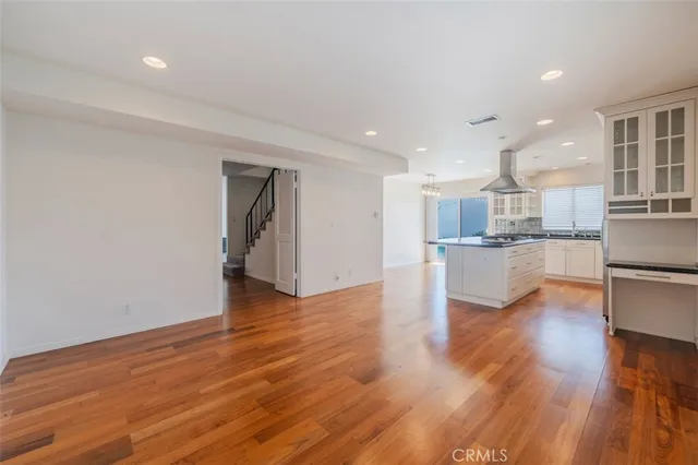 a view of kitchen with wooden floor