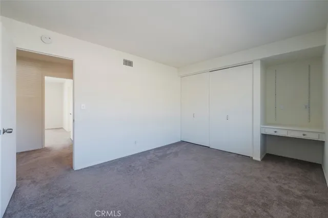 a view of a water heater room with a garage